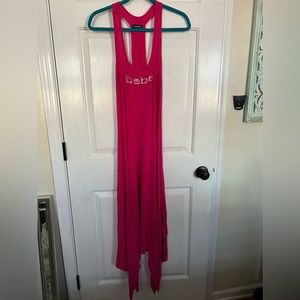 Bebe hot pink dress large with beads in the rear used